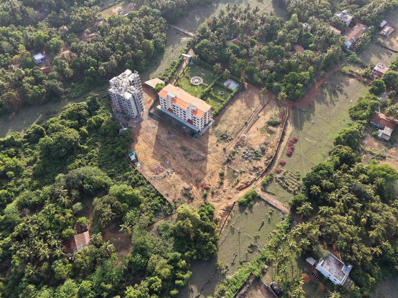 Top-down aerial of the Horizon Grande site at Tarkarli showing the landscaped grounds and towers